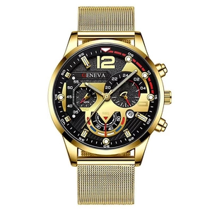 Detail of gold quartz watch featuring luminous hands, calendar, and mesh band