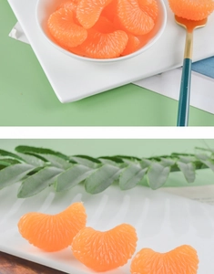 Detailed macro view of artificial PVC orange slices with realistic pulp texture in a bowl