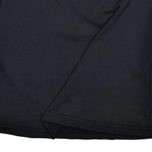 Close-up detail of black elastic fabric with professional double-needle stitching seam