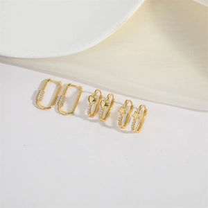 Chic gold-plated hoop earrings set featuring star and heart charms with zircon accents