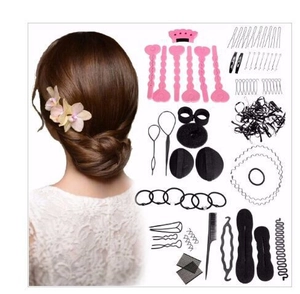 Hair styling tool set including buns makers and clips for elegant updos on a model