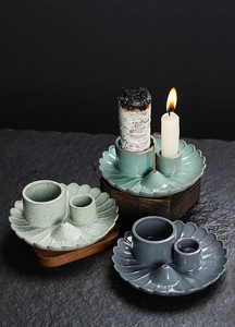 Ceramic palo santo and sage trays with ruffled edge in light green, blue, and dark grey