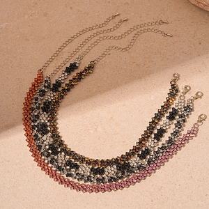 Luxurious geometric rhinestone chokers in five vibrant colors with adjustable clasp