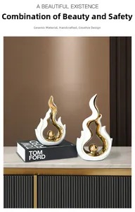Detail of luxury ceramic flame sculpture with gold sphere accent on marble surface