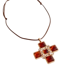 Vintage adjustable necklace with amber resin cross pendant and delicate pearl accents