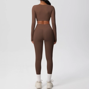 Chocolate brown two-piece yoga set with long sleeve crop top and high waist leggings
