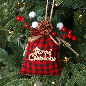 Red and black buffalo plaid Christmas tree gift bag ornament with wood Merry Christmas sign
