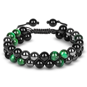 Detail of double-layer braided bracelet with green tiger eye and black obsidian stone beads