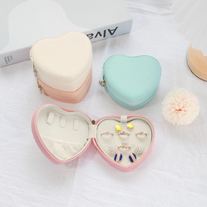 Heart-shaped PU leather jewelry travel case with multiple storage slots in pastel colors