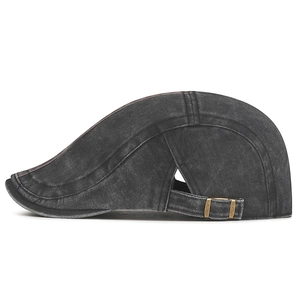 Dark grey washed denim flat cap with vintage texture and adjustable metal buckle