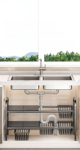 Detail of adjustable under-sink organizer showing sliding mesh basket and pipe clearance