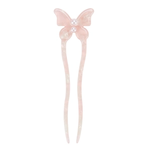 Detail of pink marble-patterned butterfly hair pin with elegant pearl accents