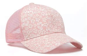 Close-up of pink floral lace patterns and breathable mesh on a summer baseball cap