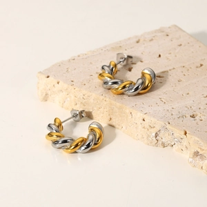 18k gold and silver dual-tone stainless steel twisted hoop earrings on stone base