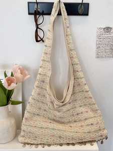 Bohemian crochet tote bag with colorful knitting, shell tassels, and large capacity