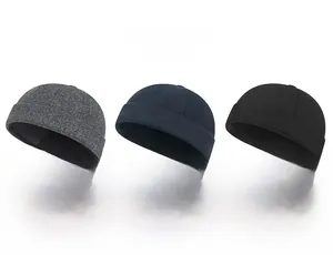 Winter wool docker hats in grey, navy, and black with metal vent hole details