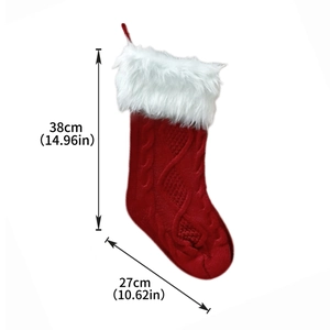 Detail showing 38x27cm dimensions for this red knit Christmas stocking with faux fur trim