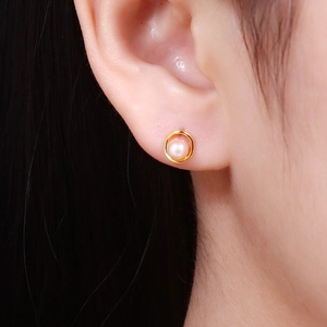 Elegant round freshwater pearl earrings with minimalist golden circular frame for women