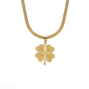 Elegant gold four-leaf clover pendant necklace with sleek snake chain for women