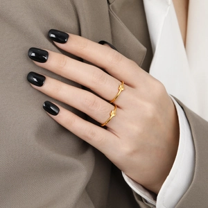 French vintage laser star pattern gold rings on fingers for a stylish minimalist look
