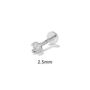 Macro detail of 2.5mm four-prong silver cartilage stud with flat back and screw thread