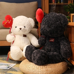 Close-up of teddy bears with rose-textured plush fur and heart-shaped balloons detail