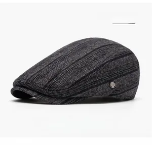 Detailed close-up of dark grey striped beret hat with premium wool texture and metal buckle
