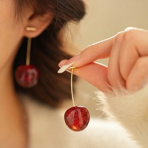 Retro cherry earrings with dark red resin spheres and gold metallic long stems