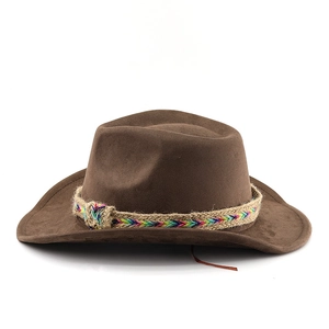Detail of dark brown faux suede cowboy hat featuring a colorful bohemian braided band