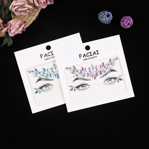 Iridescent blue and purple acrylic face jewels for masquerade makeup and festivals