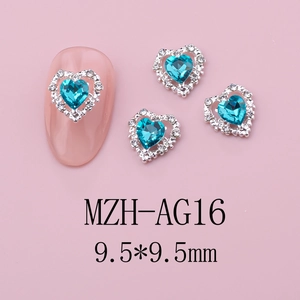 Macro detail of a 9.5mm heart-shaped blue nail rhinestone with small crystal border