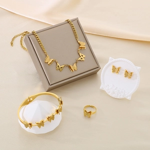 Elegant gold butterfly jewelry set with necklace earrings bracelet and open ring for women