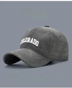 Detailed macro view of cotton baseball cap fabric texture and 3D Colorado embroidery