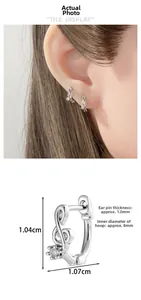 Note-shaped silver earring dimensions and real ear piercing fit demonstration