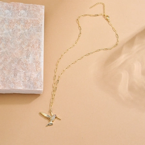 18K gold plated hummingbird necklace with sparkling zircon pavé on a paperclip chain