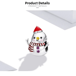 Macro detail of S925 sterling silver Christmas snowman charm with red enamel and purple zircon