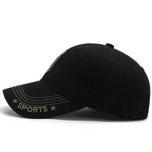 Black cotton baseball cap with gold SPORTS embroidery and star detail on side brim