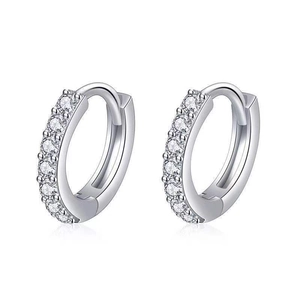 Elegant silver huggie earrings with single row zirconia stones on a white background