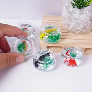 Miniature koi fish tank pendant with resin fish and aquatic plants inside small globe