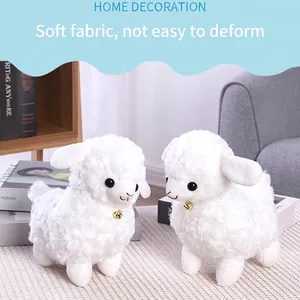 Adorable white plush sheep toys with gold bells and soft fleece texture for home decor