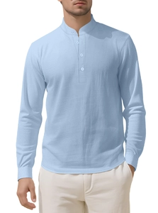 Detail view of light blue linen shirt showing mandarin collar and button placket design