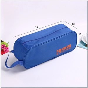 Blue waterproof travel shoe storage bag with zipper and handle, 33x12x13cm