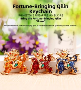 Detailed close-up of three sparkling kylin keychains featuring colorful inlaid rhinestones