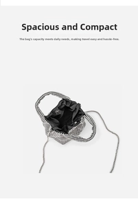 Macro view of silver rhinestone bucket bag showing black lining and magnetic closure