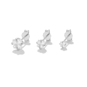 Detailed macro view of S925 sterling silver star studs with 925 hallmarks