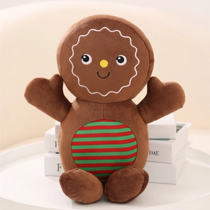 Mignon bonhomme en pain d'épices en peluche avec glaçage et motif rayé rouge vert