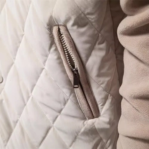 Men's beige quilted jacket with classic diamond pattern and warm fleece raglan sleeves