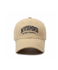 Front detail of khaki baseball cap with black embroidered NVRMND text on cotton fabric