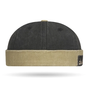 Vintage docker hat with washed canvas fabric and contrast brim showing side letter patch