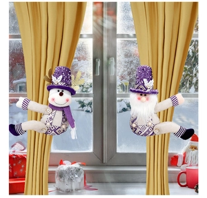 Detail of Christmas snowman and Santa curtain tiebacks with purple sequins and knit texture